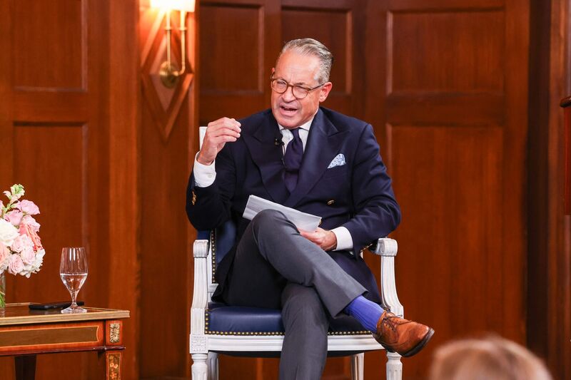 Socrates in the City Bonhoeffer roundtable: moderator speaking from his chair