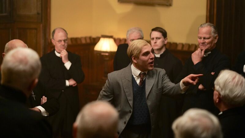 Bonhoeffer film still: Dietrich Bonhoeffer challenging a room of church leaders
